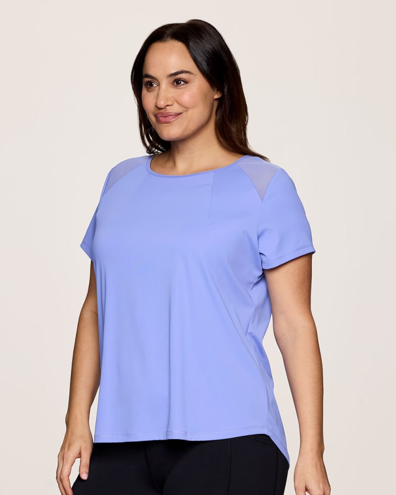 Front of a model wearing a size 2X Plus On The Run Tee in Periwinkle by RBX Active. | dia_product_style_image_id:347920